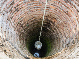 Bucket in ancient well Pace Analytical Ground Water image