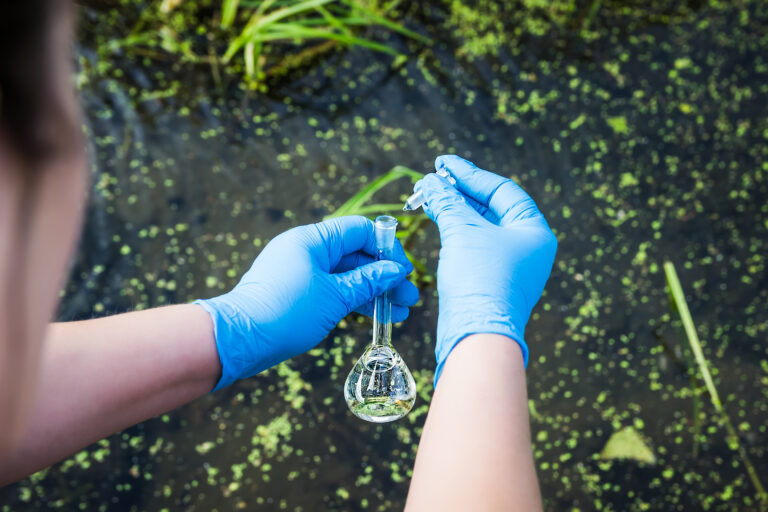 A water sample from the river. Water intake. Water abstraction