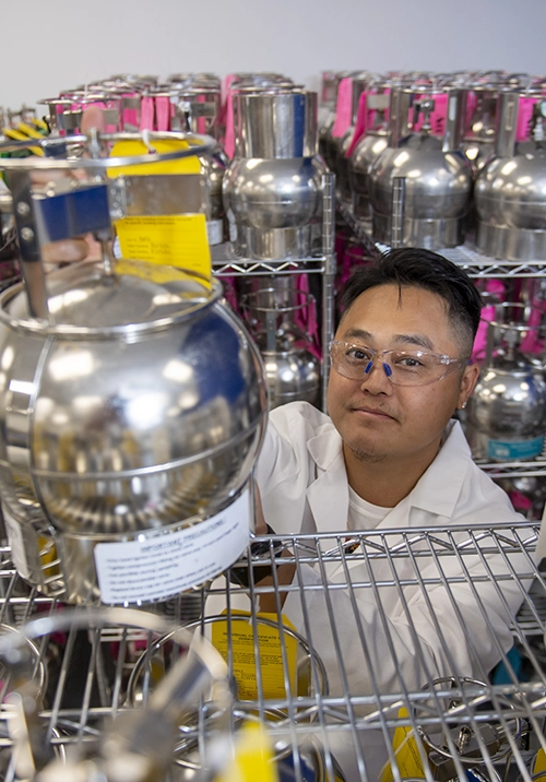 Pace Scientist working with Air Canister in Laboratory. Meteorological monitoring, Air Testing