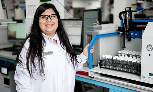 Pace scientist working in laboratory. The purge and trap procedure involves purging a sample with an inert gas to volatilize the VOCs present in the sample. These volatilized compounds are then trapped onto an adsorbent material. Following the trapping process, the adsorbent material is heated, and the VOCs are released (desorbed) before being analyzed using gas chromatography or gas chromatography-mass spectrometry (GC-MS). The purge and trap method is designed to manage water vapor while simultaneously achieving low detection limits in the parts-per-billion range.