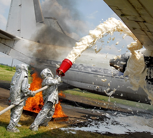 Airport fire fighters putting out fire on airplane. PFAS testing, PFAS in Drinking Water, PFAS Regulations, PFAS Chemicals, PFAS Analysis